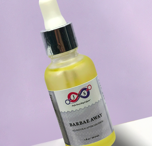Close-up of a Barbae Away Aftercare Serum bottle