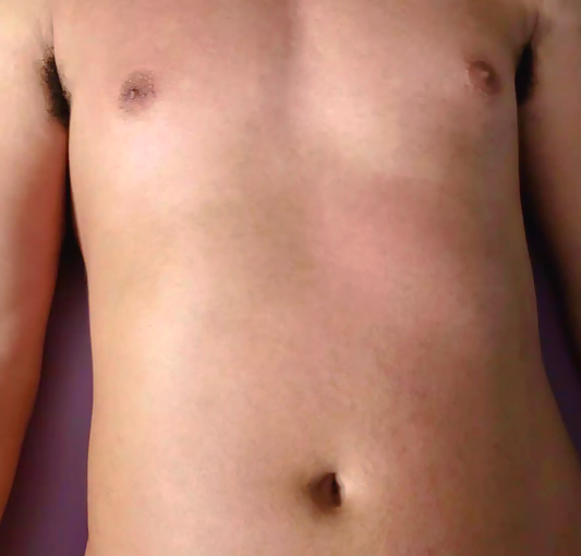 Close-up of a fully waxed mixed race male torso